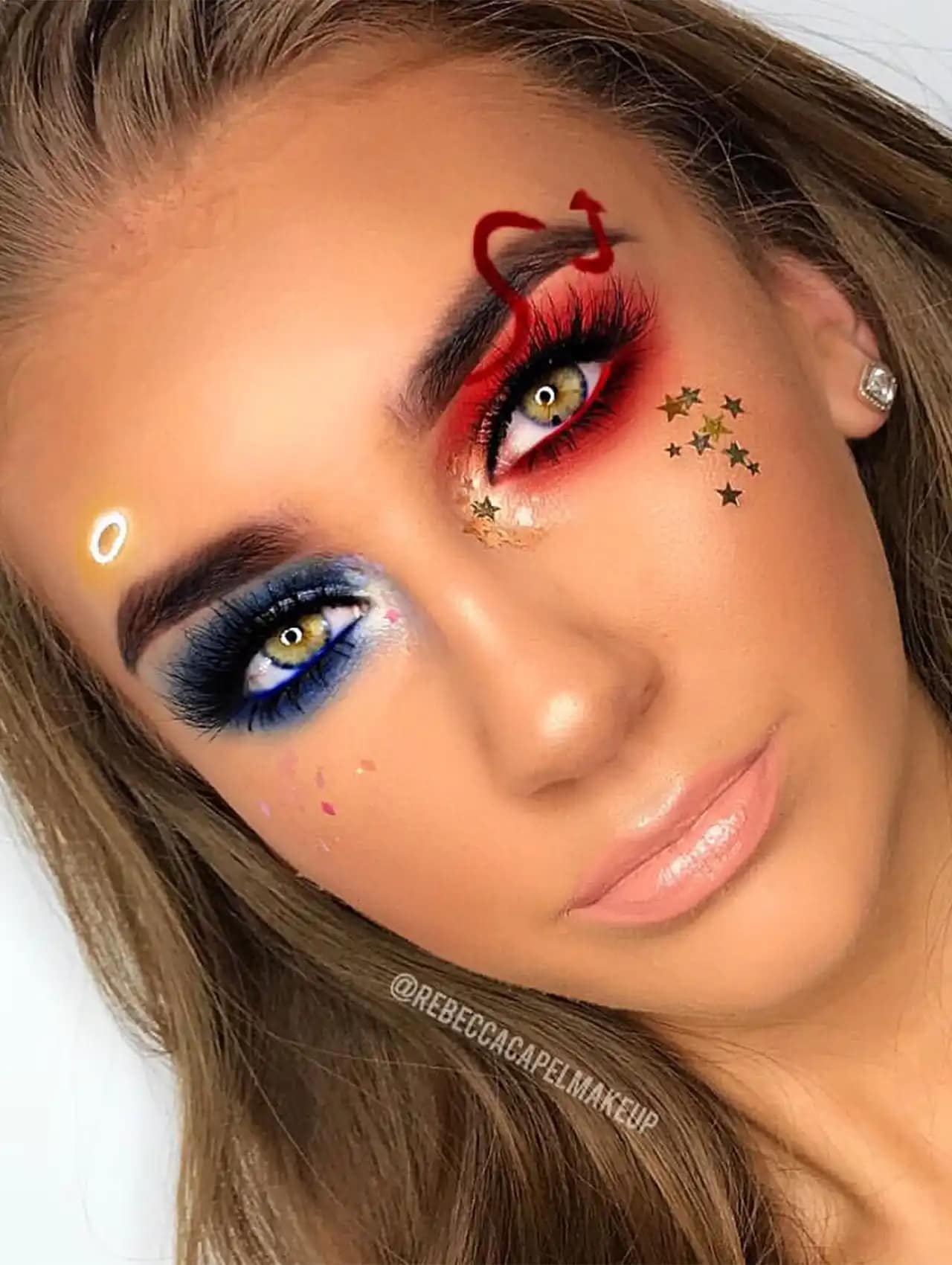 Creative halloween makeup looks featuring half devil and half angel face design with red and blue eyeshadow.