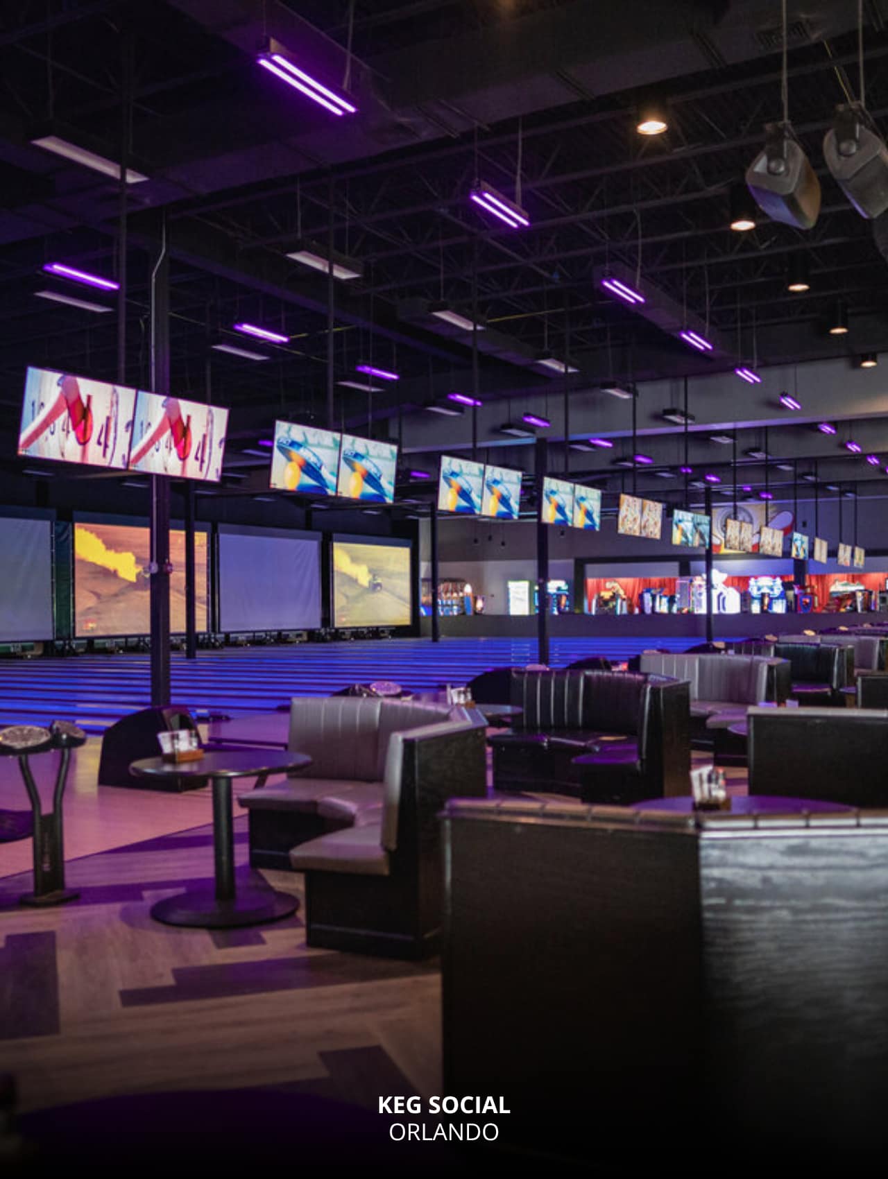 Neon-lit bowling alley and screens at Keg Social, Orlando Sports Bars